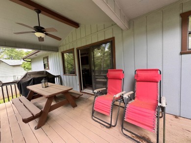 A great location overlooking the South Fork River next to the on Cherokee Village North Course in Arkansas - for sale on GolfHomes.com, golf home, golf lot