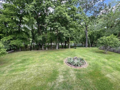 A great location overlooking the South Fork River next to the on Cherokee Village North Course in Arkansas - for sale on GolfHomes.com, golf home, golf lot