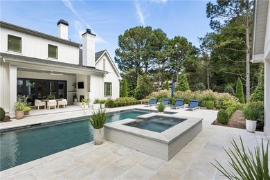 The epitome of right-sized luxury living awaits in this on Hawks Ridge Golf Club in Georgia - for sale on GolfHomes.com, golf home, golf lot