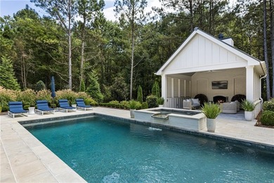 The epitome of right-sized luxury living awaits in this on Hawks Ridge Golf Club in Georgia - for sale on GolfHomes.com, golf home, golf lot