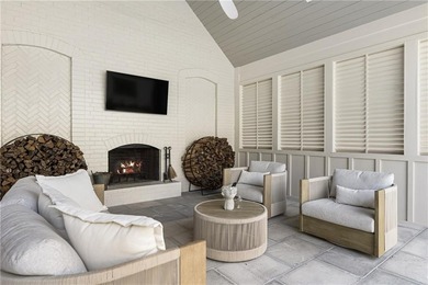 The epitome of right-sized luxury living awaits in this on Hawks Ridge Golf Club in Georgia - for sale on GolfHomes.com, golf home, golf lot