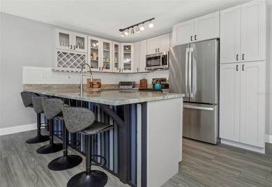 Beautifully updated 2-bedroom, 2-bath first-floor condo located on Lansbrook Golf Club in Florida - for sale on GolfHomes.com, golf home, golf lot