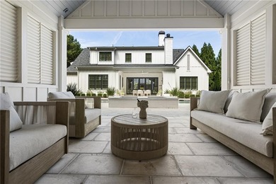 The epitome of right-sized luxury living awaits in this on Hawks Ridge Golf Club in Georgia - for sale on GolfHomes.com, golf home, golf lot