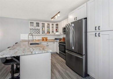 Beautifully updated 2-bedroom, 2-bath first-floor condo located on Lansbrook Golf Club in Florida - for sale on GolfHomes.com, golf home, golf lot