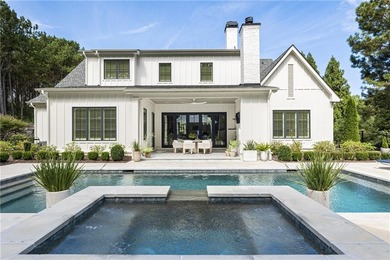 The epitome of right-sized luxury living awaits in this on Hawks Ridge Golf Club in Georgia - for sale on GolfHomes.com, golf home, golf lot