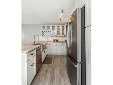 Beautifully updated 2-bedroom, 2-bath first-floor condo located on Lansbrook Golf Club in Florida - for sale on GolfHomes.com, golf home, golf lot