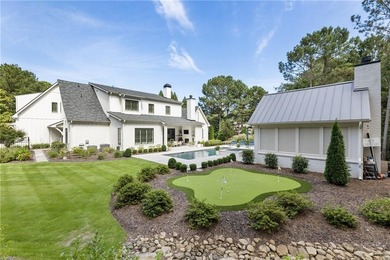 The epitome of right-sized luxury living awaits in this on Hawks Ridge Golf Club in Georgia - for sale on GolfHomes.com, golf home, golf lot