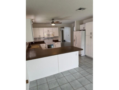 Best priced pool home in the Villages! You don't want to miss on Tierra Del Sol Golf and Country Club in Florida - for sale on GolfHomes.com, golf home, golf lot