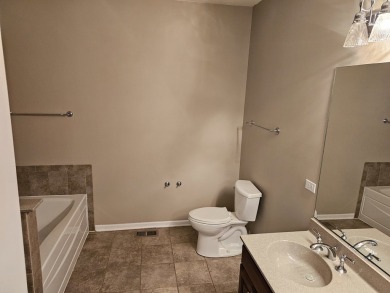 Well maintained 2 bdrm, 2 bath Ellison model with newer easy on Carillon Lakes 3 Hole Course in Illinois - for sale on GolfHomes.com, golf home, golf lot