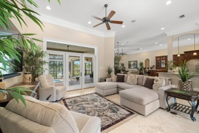 Boating enthusiasts, look no further! Timeless beauty right off on Regatta Bay Golf and Country Club in Florida - for sale on GolfHomes.com, golf home, golf lot