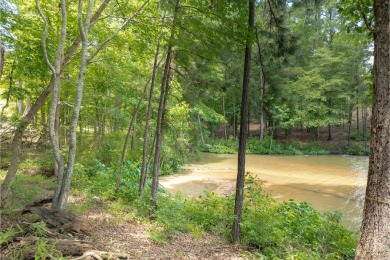 Tucked in a peaceful cove, this exceptional lakefront home site on Reynolds Lake Oconee - The Oconee in Georgia - for sale on GolfHomes.com, golf home, golf lot