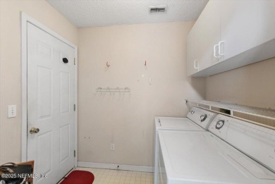 Nestled on a quiet dead-end street in an awesome neighborhood on Windsor Parke Golf Club in Florida - for sale on GolfHomes.com, golf home, golf lot