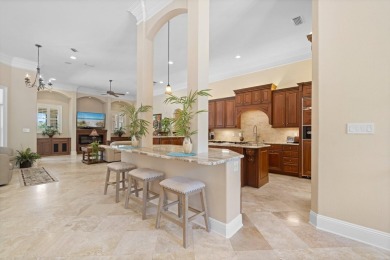 Boating enthusiasts, look no further! Timeless beauty right off on Regatta Bay Golf and Country Club in Florida - for sale on GolfHomes.com, golf home, golf lot