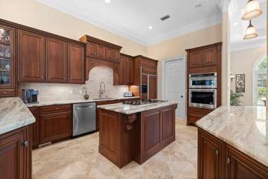 Boating enthusiasts, look no further! Timeless beauty right off on Regatta Bay Golf and Country Club in Florida - for sale on GolfHomes.com, golf home, golf lot