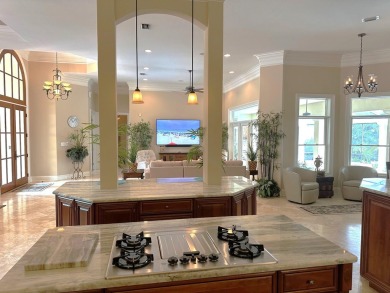 Boating enthusiasts, look no further! Timeless beauty right off on Regatta Bay Golf and Country Club in Florida - for sale on GolfHomes.com, golf home, golf lot