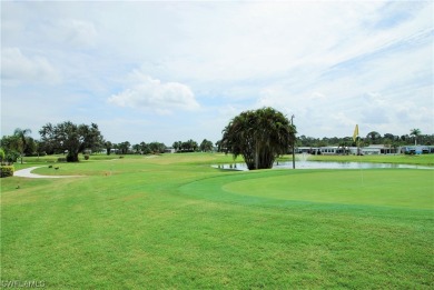 Beautiful residence with sweeping golf course views and a host on Six Lakes Country Club in Florida - for sale on GolfHomes.com, golf home, golf lot