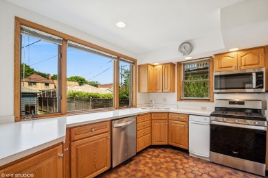 This sun-drenched 3-bedroom, 2.5-bath classic brick on Billy Caldwell Golf Course in Illinois - for sale on GolfHomes.com, golf home, golf lot