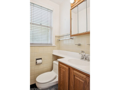 This sun-drenched 3-bedroom, 2.5-bath classic brick on Billy Caldwell Golf Course in Illinois - for sale on GolfHomes.com, golf home, golf lot