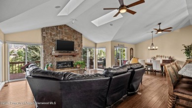 Find comfort and charm in a home nestled on the scenic fairways on Battlement Mesa Golf Course in Colorado - for sale on GolfHomes.com, golf home, golf lot