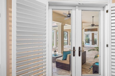 Boating enthusiasts, look no further! Timeless beauty right off on Regatta Bay Golf and Country Club in Florida - for sale on GolfHomes.com, golf home, golf lot