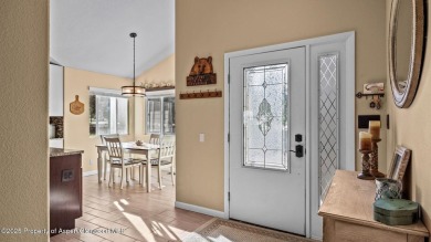 Find comfort and charm in a home nestled on the scenic fairways on Battlement Mesa Golf Course in Colorado - for sale on GolfHomes.com, golf home, golf lot