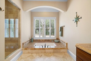 Boating enthusiasts, look no further! Timeless beauty right off on Regatta Bay Golf and Country Club in Florida - for sale on GolfHomes.com, golf home, golf lot