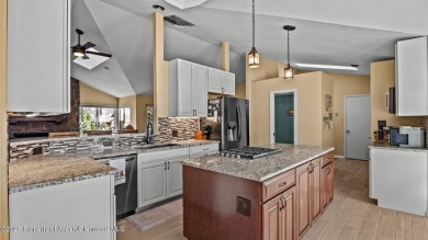 Find comfort and charm in a home nestled on the scenic fairways on Battlement Mesa Golf Course in Colorado - for sale on GolfHomes.com, golf home, golf lot