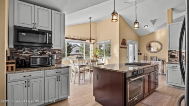 Find comfort and charm in a home nestled on the scenic fairways on Battlement Mesa Golf Course in Colorado - for sale on GolfHomes.com, golf home, golf lot