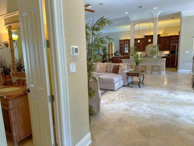Boating enthusiasts, look no further! Timeless beauty right off on Regatta Bay Golf and Country Club in Florida - for sale on GolfHomes.com, golf home, golf lot