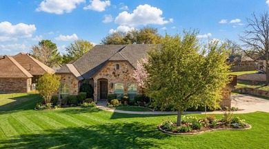 Beautiful 3-bedroom, 2.5-bath home with an oversized 3-car on Pecan Plantation Country Club in Texas - for sale on GolfHomes.com, golf home, golf lot