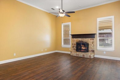 Beautiful 3-bedroom, 2.5-bath home with an oversized 3-car on Pecan Plantation Country Club in Texas - for sale on GolfHomes.com, golf home, golf lot