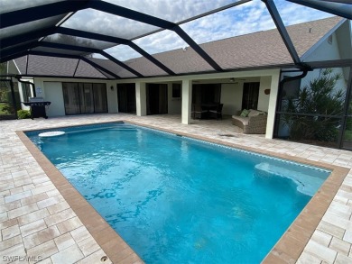 Brand new custom pool with water fountains to keep the pool nice on Riverbend Golf and Country Club in Florida - for sale on GolfHomes.com, golf home, golf lot