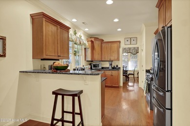 Experience refined living in this beautifully maintained brick on Country Club of Landfall in North Carolina - for sale on GolfHomes.com, golf home, golf lot