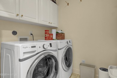 Experience refined living in this beautifully maintained brick on Country Club of Landfall in North Carolina - for sale on GolfHomes.com, golf home, golf lot