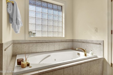 Experience refined living in this beautifully maintained brick on Country Club of Landfall in North Carolina - for sale on GolfHomes.com, golf home, golf lot