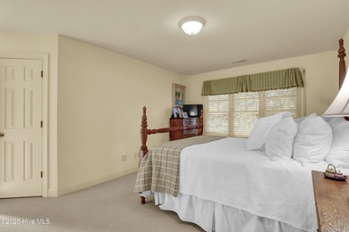 Experience refined living in this beautifully maintained brick on Country Club of Landfall in North Carolina - for sale on GolfHomes.com, golf home, golf lot