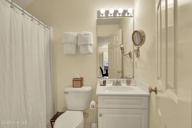 Experience refined living in this beautifully maintained brick on Country Club of Landfall in North Carolina - for sale on GolfHomes.com, golf home, golf lot