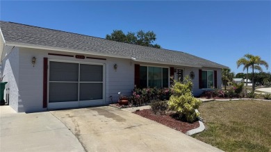 Charming and updated 2-bedroom, 1-bath, 1-car garage home on an on Duffys Golf Center in Florida - for sale on GolfHomes.com, golf home, golf lot