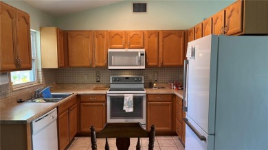 Charming and updated 2-bedroom, 1-bath, 1-car garage home on an on Duffys Golf Center in Florida - for sale on GolfHomes.com, golf home, golf lot