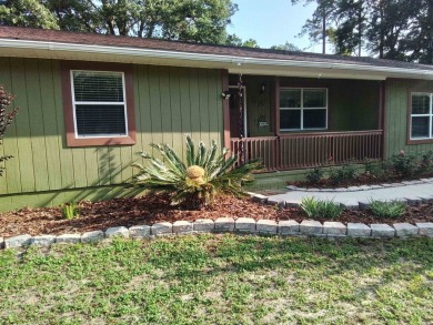 Hurry so you don't miss this one! Motivated sellers! Beautifully on Wildwood Country Club in Florida - for sale on GolfHomes.com, golf home, golf lot