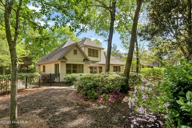 Experience refined living in this beautifully maintained brick on Country Club of Landfall in North Carolina - for sale on GolfHomes.com, golf home, golf lot