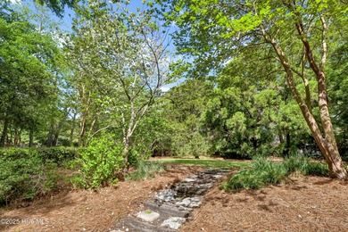 Experience refined living in this beautifully maintained brick on Country Club of Landfall in North Carolina - for sale on GolfHomes.com, golf home, golf lot