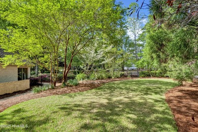 Experience refined living in this beautifully maintained brick on Country Club of Landfall in North Carolina - for sale on GolfHomes.com, golf home, golf lot