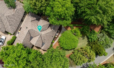 Experience refined living in this beautifully maintained brick on Country Club of Landfall in North Carolina - for sale on GolfHomes.com, golf home, golf lot