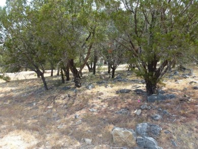 Nice corner lot on a cul-de-sac has distant lake views from the on Summit Rock Golf Course in Texas - for sale on GolfHomes.com, golf home, golf lot