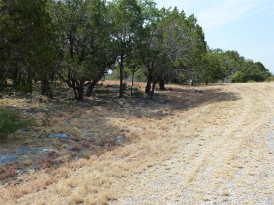 Nice corner lot on a cul-de-sac has distant lake views from the on Summit Rock Golf Course in Texas - for sale on GolfHomes.com, golf home, golf lot