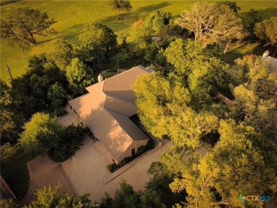 Distinctive brick traditional home backing up to fairway of Mill on Mill Creek Golf Club in Texas - for sale on GolfHomes.com, golf home, golf lot