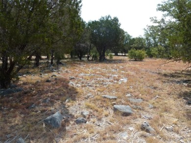 Nice corner lot on a cul-de-sac has distant lake views from the on Summit Rock Golf Course in Texas - for sale on GolfHomes.com, golf home, golf lot
