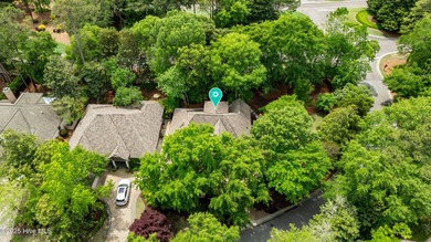 Experience refined living in this beautifully maintained brick on Country Club of Landfall in North Carolina - for sale on GolfHomes.com, golf home, golf lot