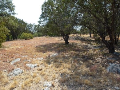 Nice corner lot on a cul-de-sac has distant lake views from the on Summit Rock Golf Course in Texas - for sale on GolfHomes.com, golf home, golf lot